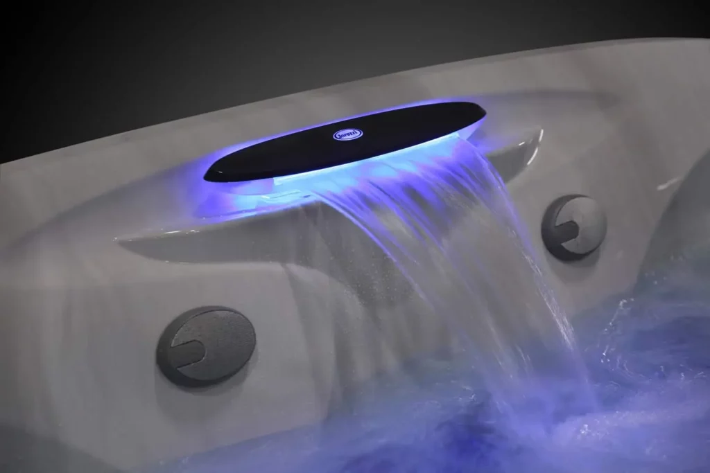 waterfall in hot tub with lights from jacuzzi