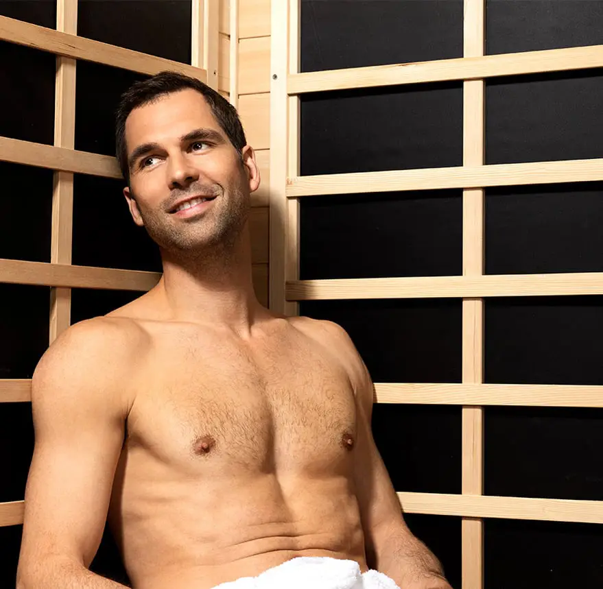 man enjoying finnleo infrared sauna